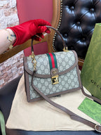 Ophidia medium top handle bag