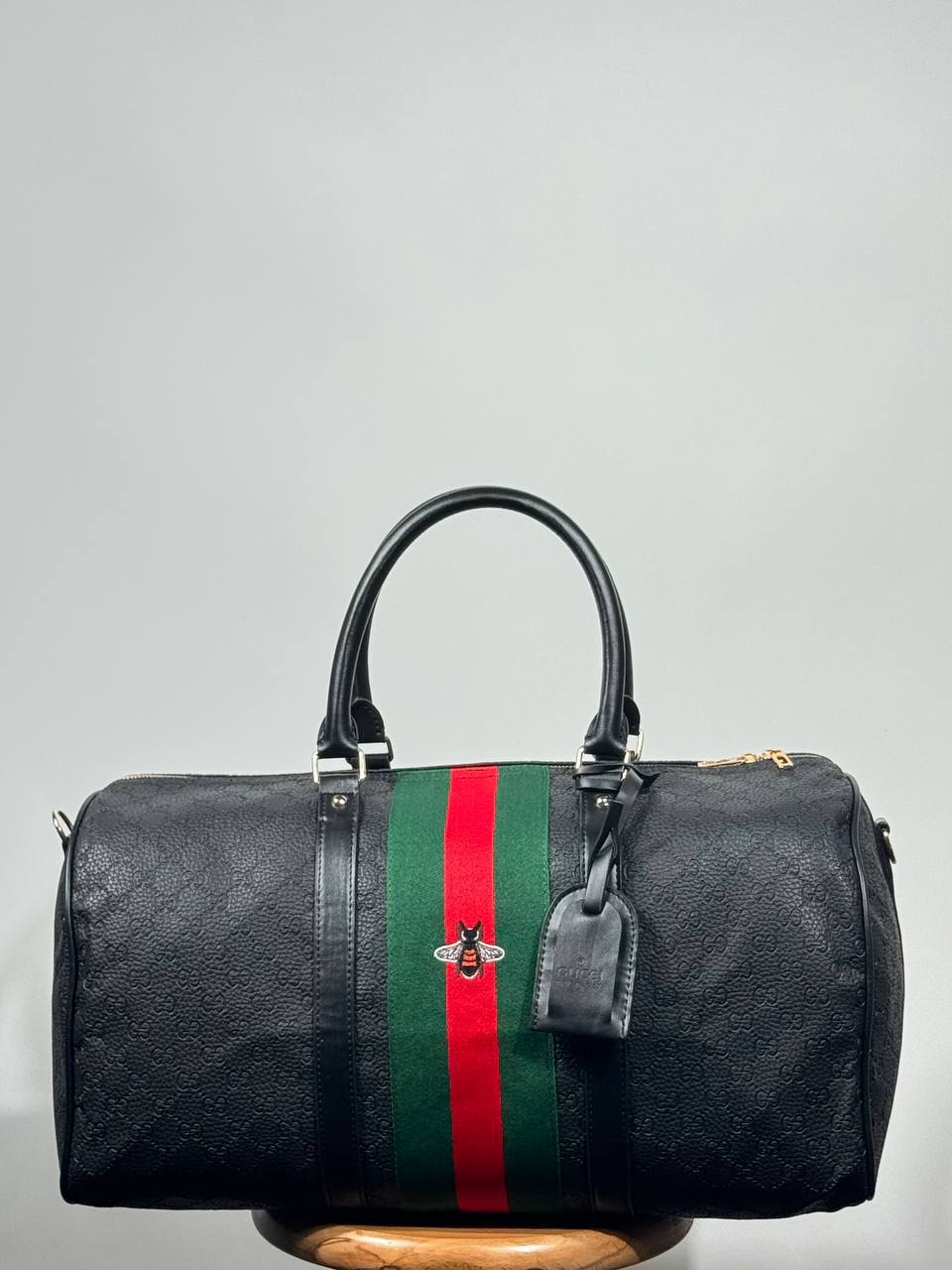 g.g bee-themed suitcase-style bag