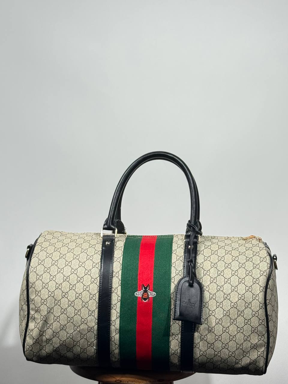 g.g bee-themed suitcase-style bag