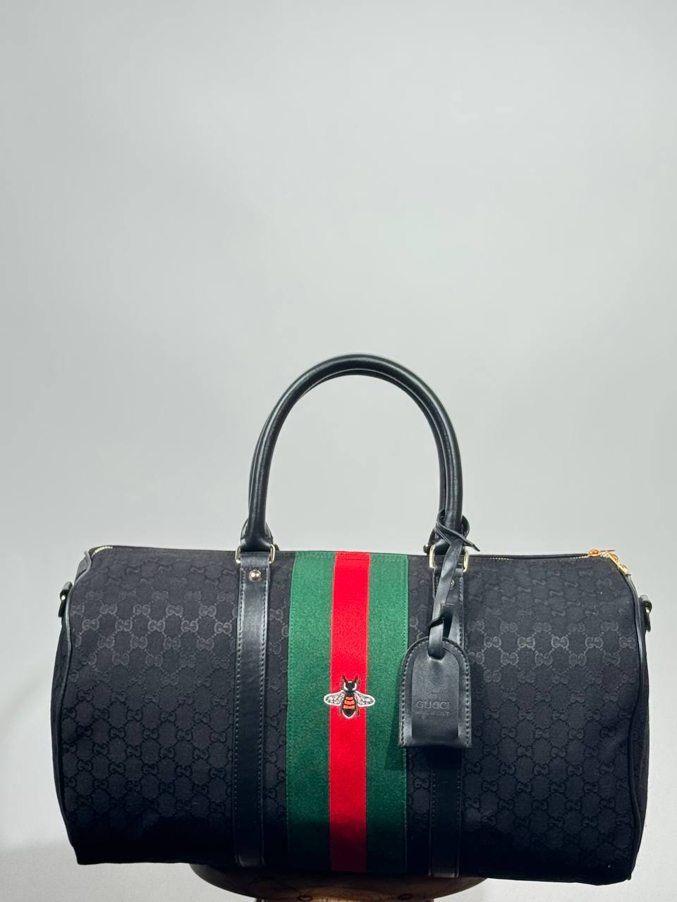 g.g bee-themed suitcase-style bag
