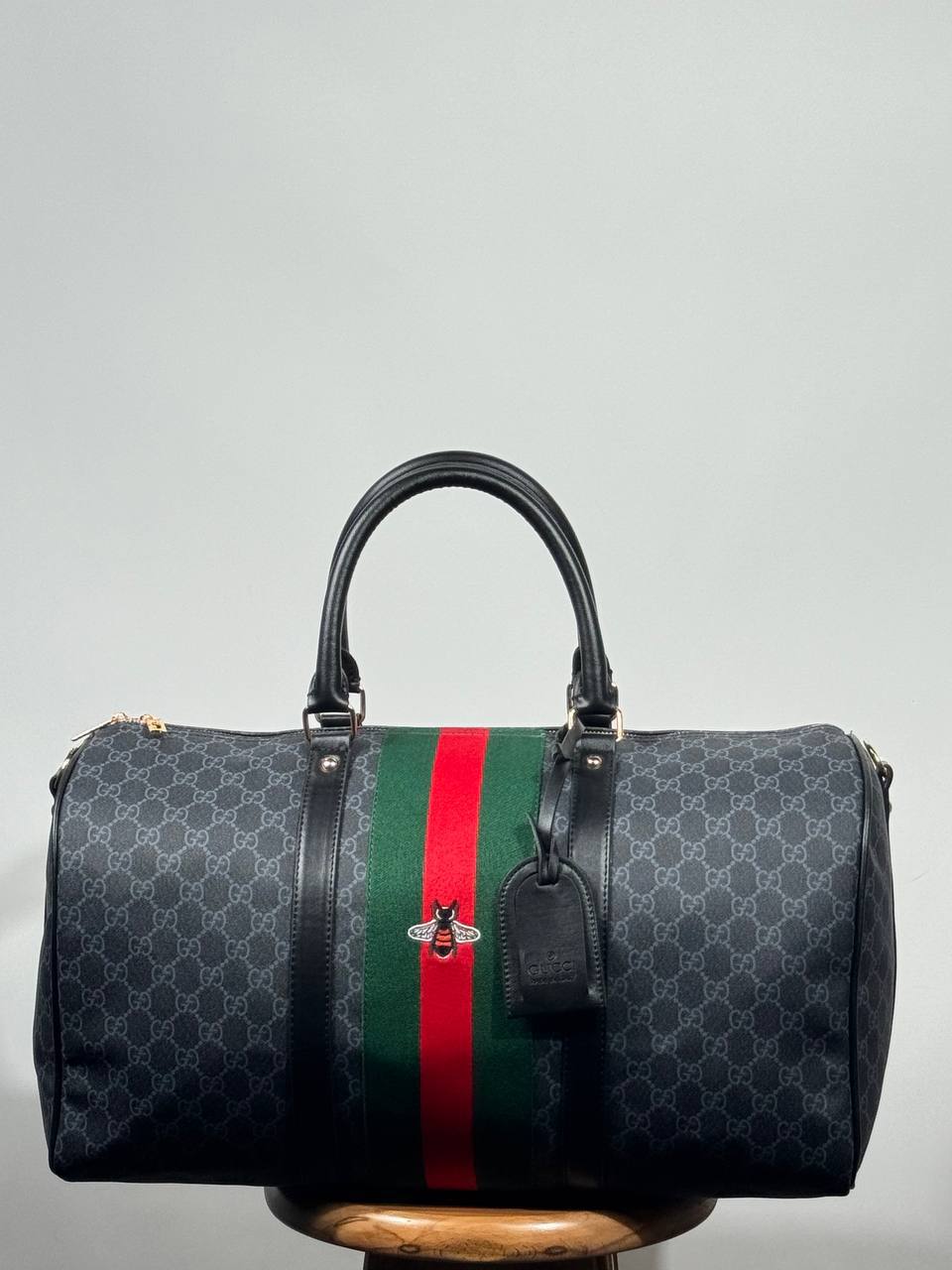 g.g bee-themed suitcase-style bag
