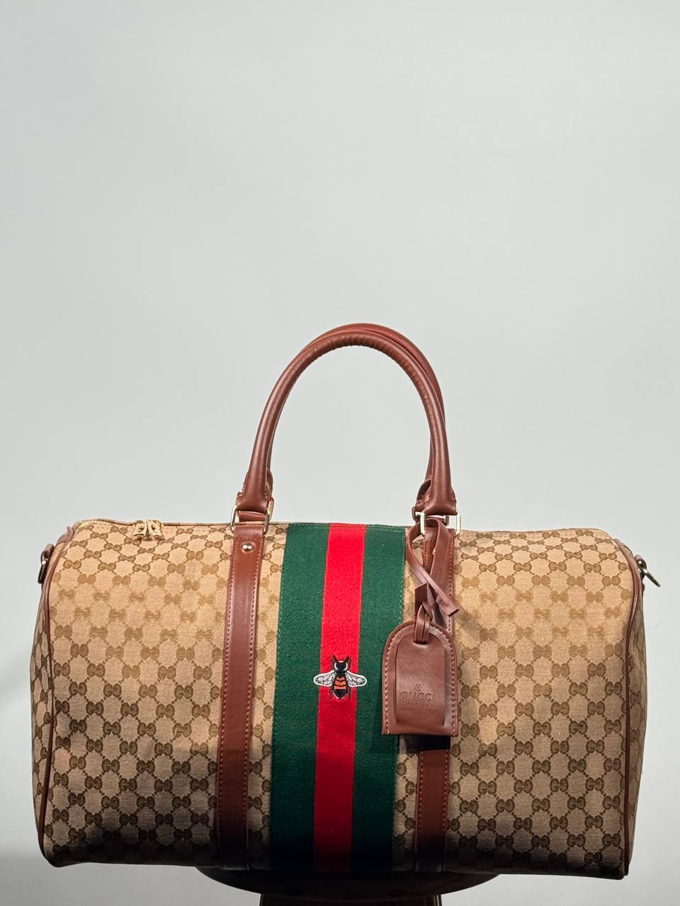 g.g bee-themed suitcase-style bag